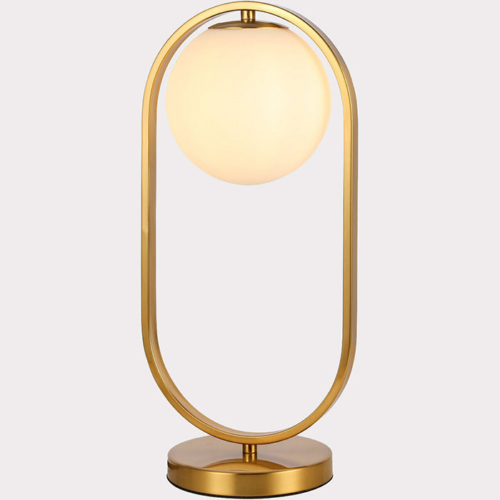 Gouden Emma tafellamp met witte bol met verlichting aan